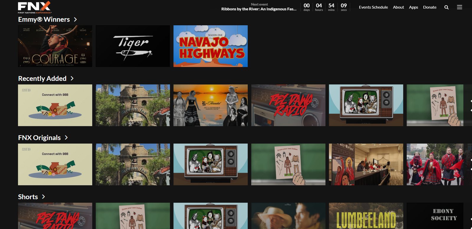 The FNX on-demand library, with rows for Emmy winners, recently added programs, FNX Originals, and shorts
